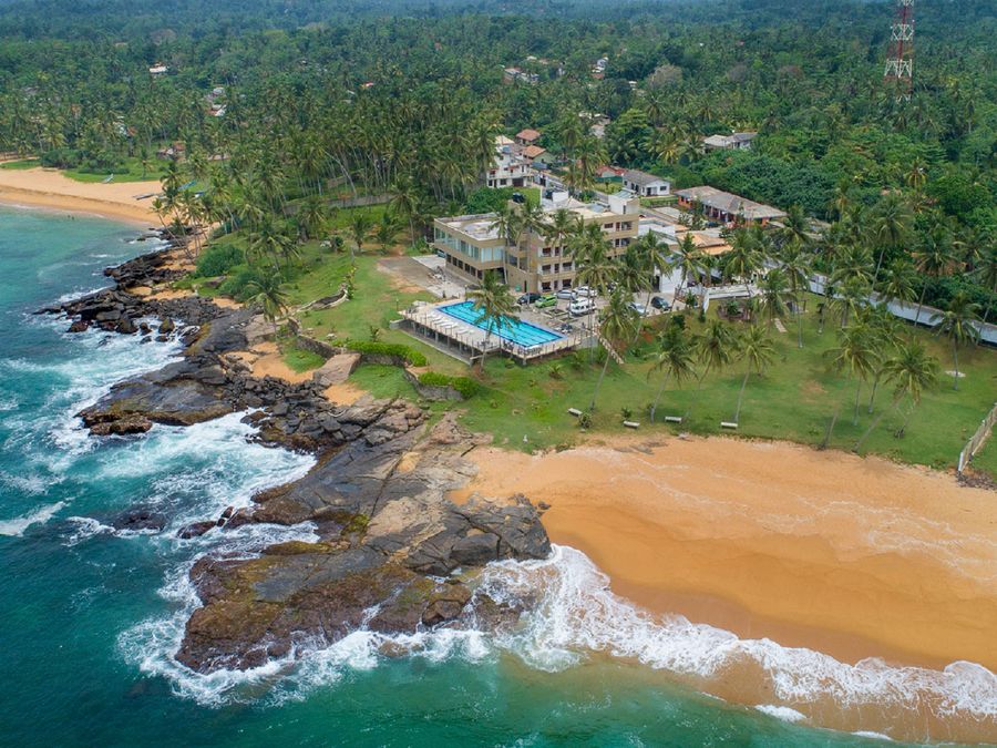 The shoreline and shallow reef water along the coast at Hikkaduwa