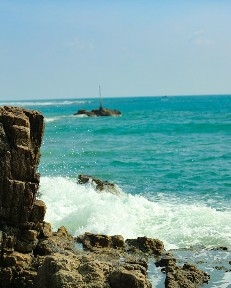 Clear turquoise water and an empty white-sand beach on Sri Lanka's east coast
